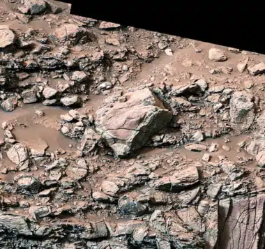 At Center, A Martian Rock Displaying A Clear Halo Created By Ancient Interactions With Water
